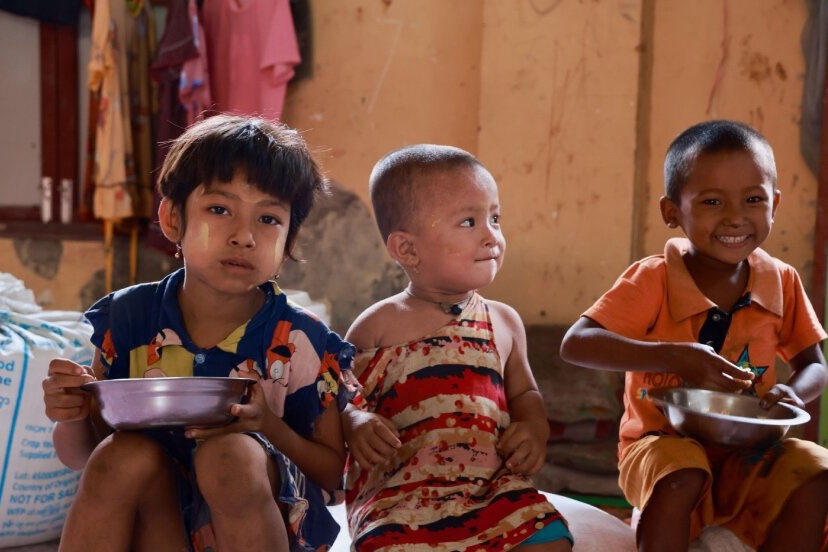 Three eating children